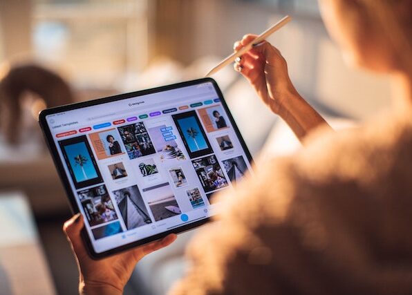 Photo by Roberto Nickson: https://www.pexels.com/photo/woman-holding-tablet-computer-3082341/